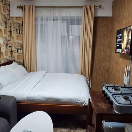 Lovely & Cozy Compact Studio Near Airport With Rooftop View Appartement Nairobi Buitenkant foto