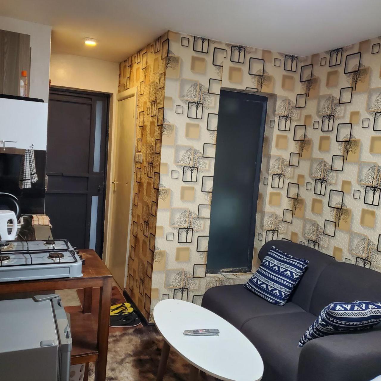 Lovely & Cozy Compact Studio Near Airport With Rooftop View Appartement Nairobi Buitenkant foto