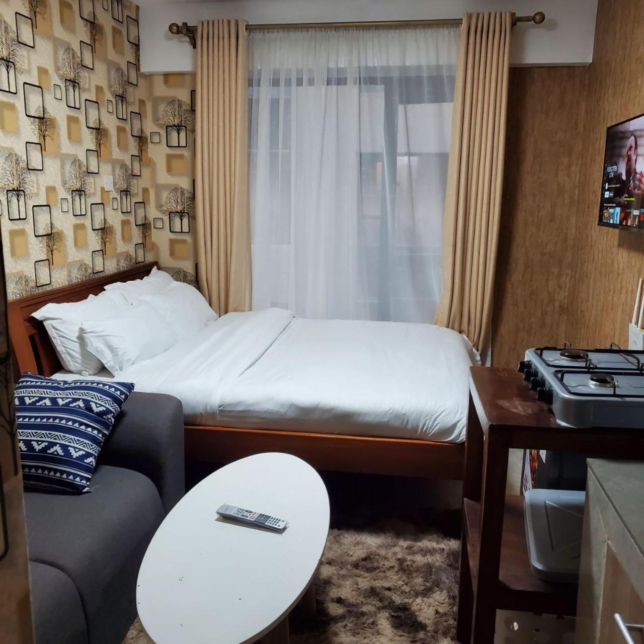 Lovely & Cozy Compact Studio Near Airport With Rooftop View Appartement Nairobi Buitenkant foto