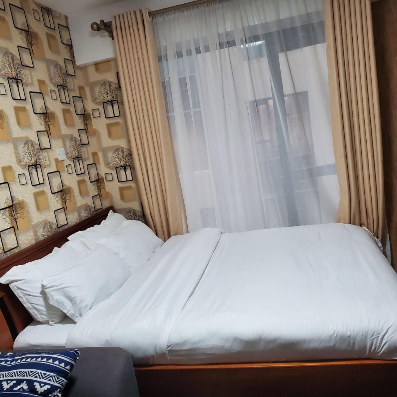 Lovely & Cozy Compact Studio Near Airport With Rooftop View Appartement Nairobi Buitenkant foto