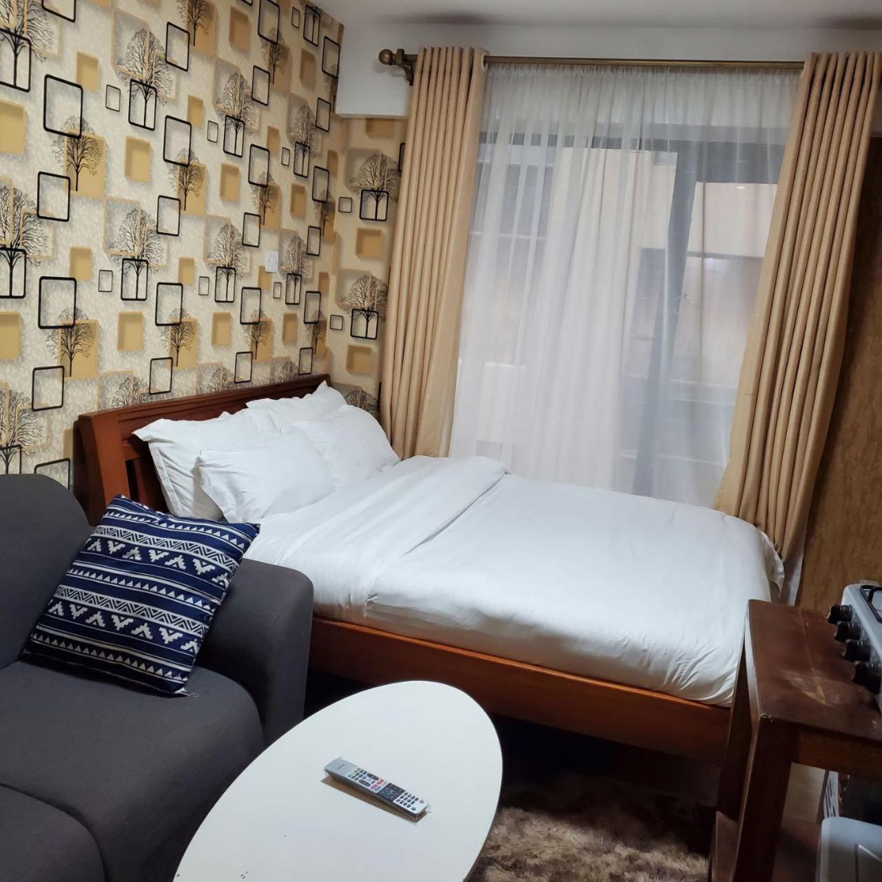 Lovely & Cozy Compact Studio Near Airport With Rooftop View Appartement Nairobi Buitenkant foto