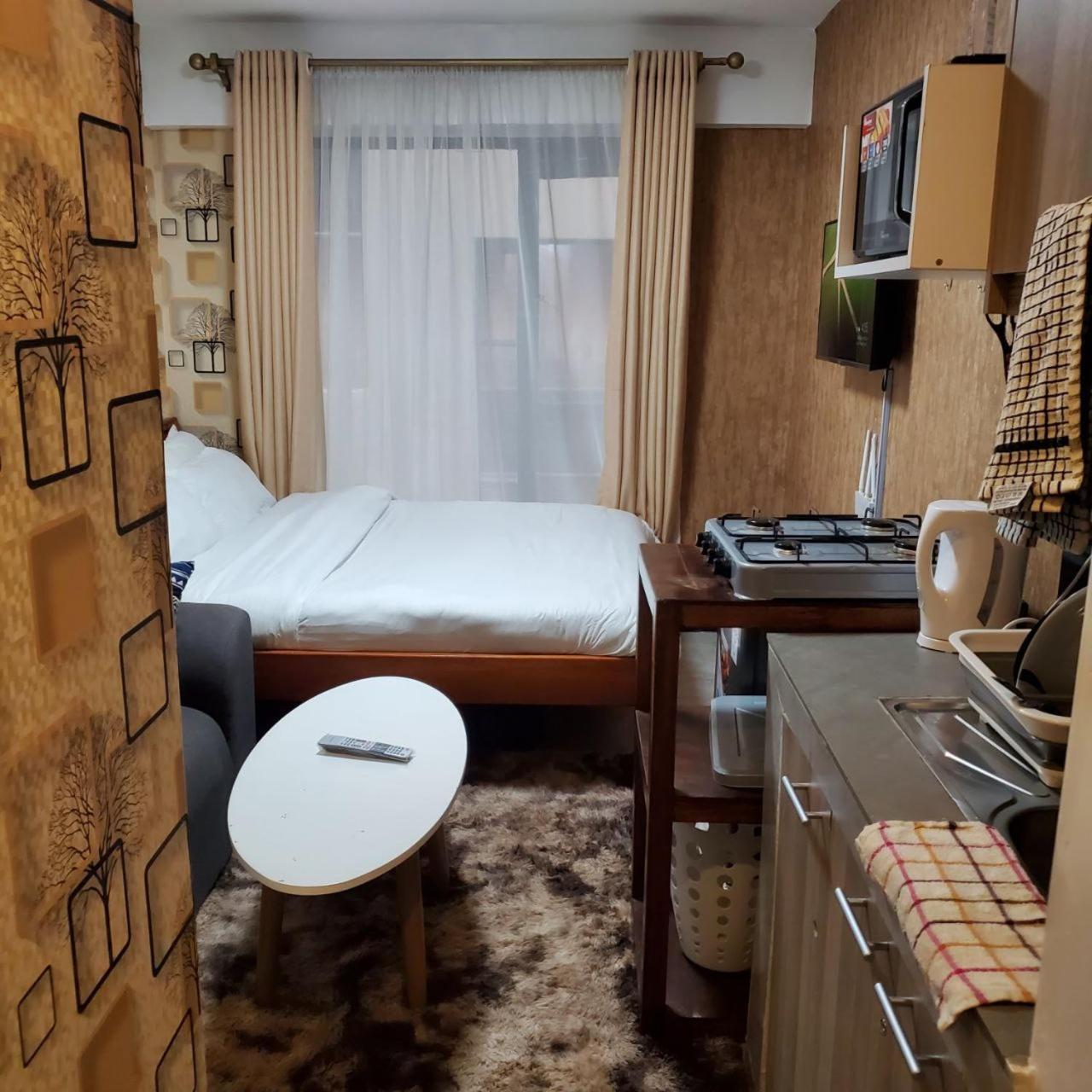 Lovely & Cozy Compact Studio Near Airport With Rooftop View Appartement Nairobi Buitenkant foto