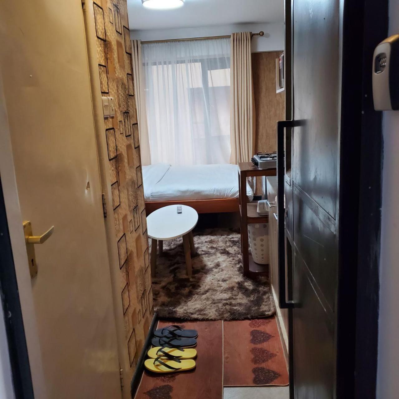 Lovely & Cozy Compact Studio Near Airport With Rooftop View Appartement Nairobi Buitenkant foto